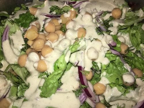 Salad with creamy roasted garlic dressing (vegan)