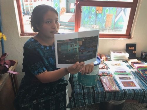 Learning about the Pintando Santa Catarina project in the office on the central square