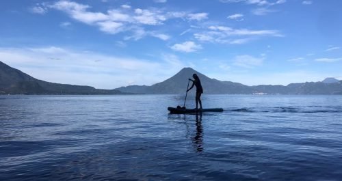Photo of Traci paddleboarding on Lake Atitlan