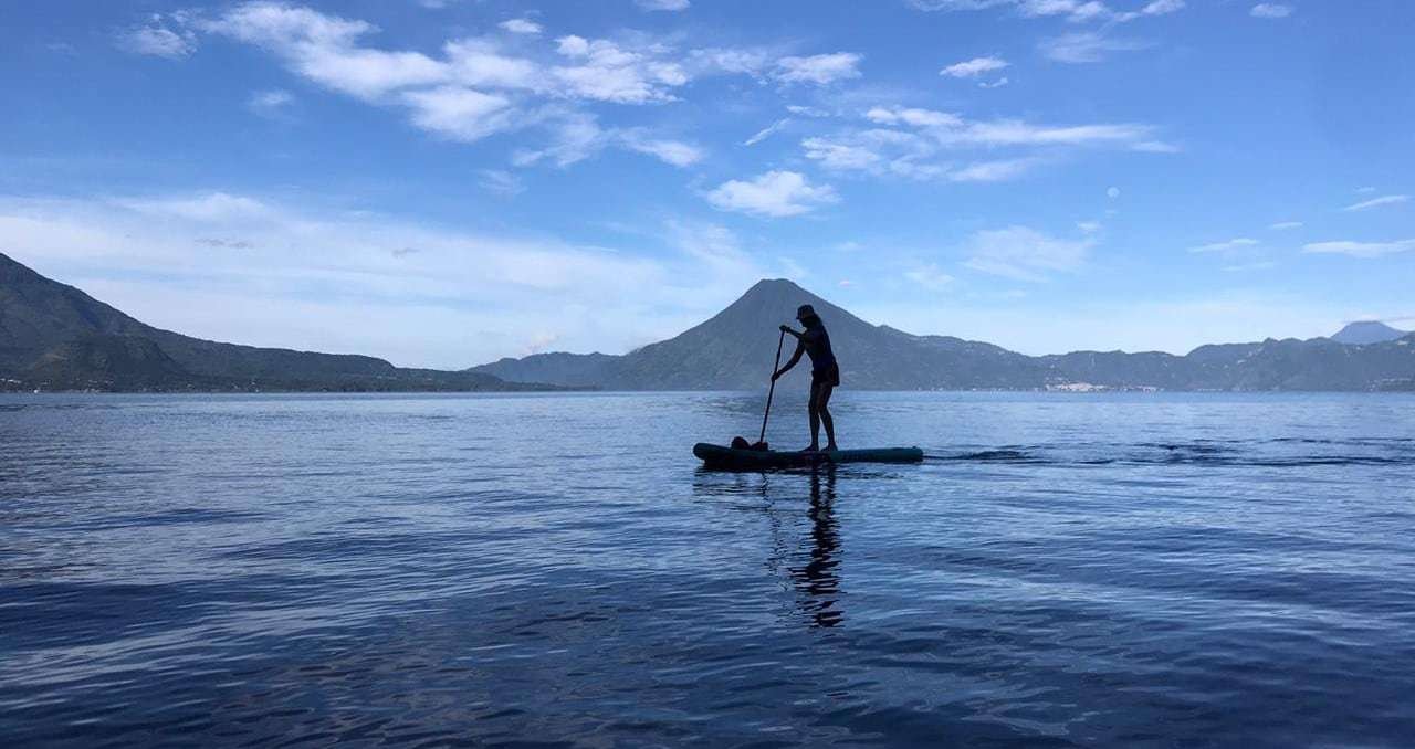 Photo of Traci paddleboarding on Lake Atitlan