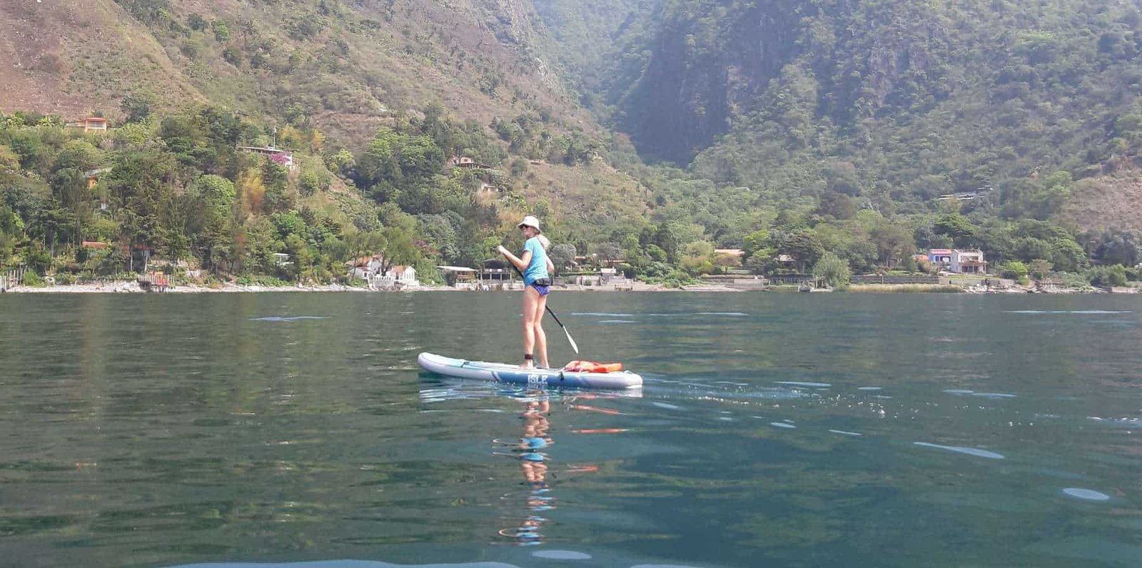 Traci paddleboarding for the first time in Santa Cruz La Laguna